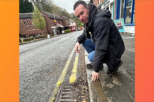 Luke inspecting a blocked gully by The Cross in Lymm