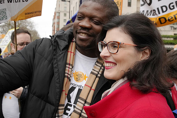 Layla Moran A man taking a selfie with Layla Moran