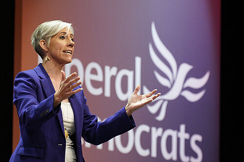 Daisy Cooper MP giving a speech
